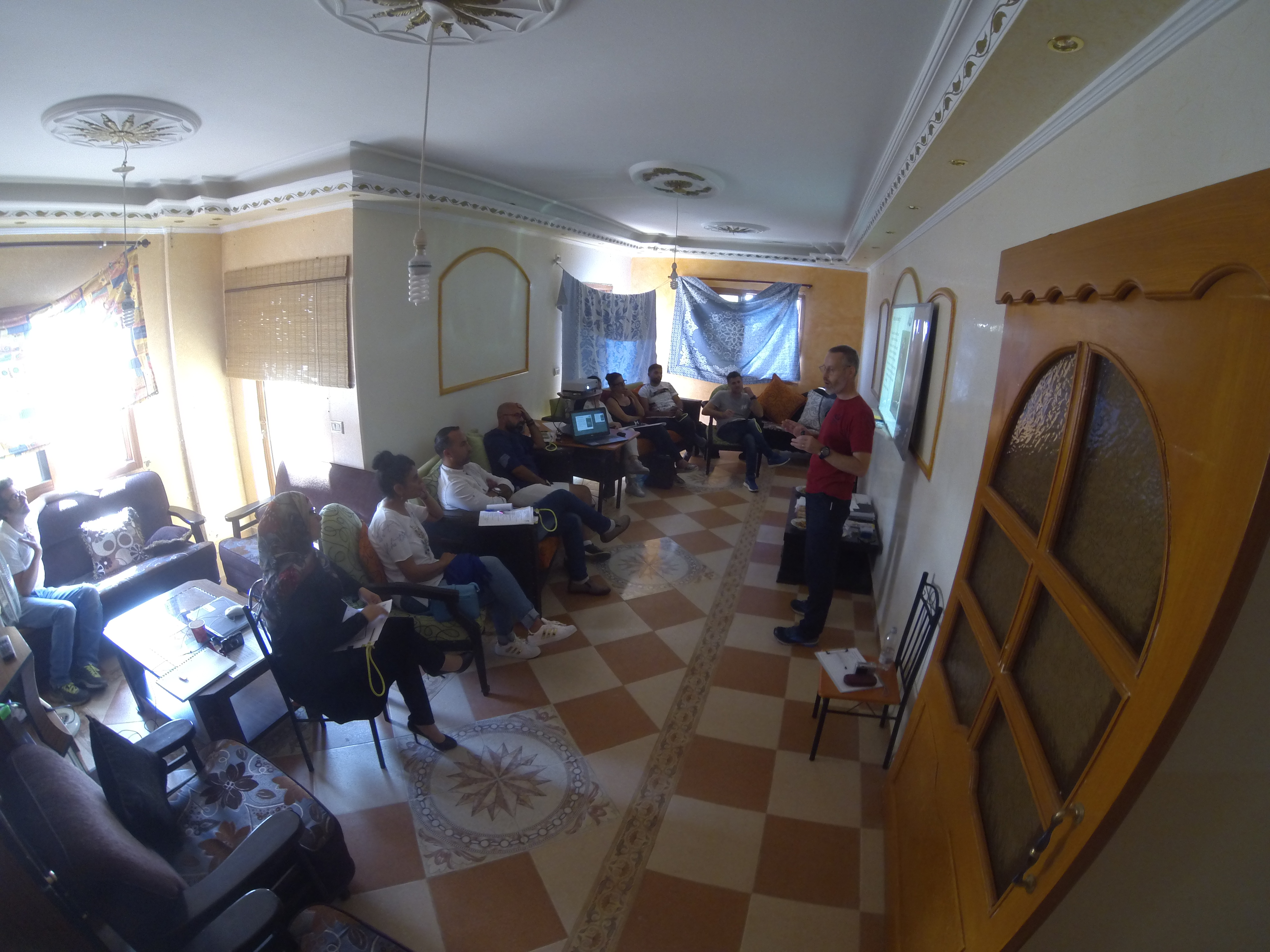 Dave lecturing in the apartment's classroom